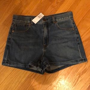 Medium wash jean mom shorts.